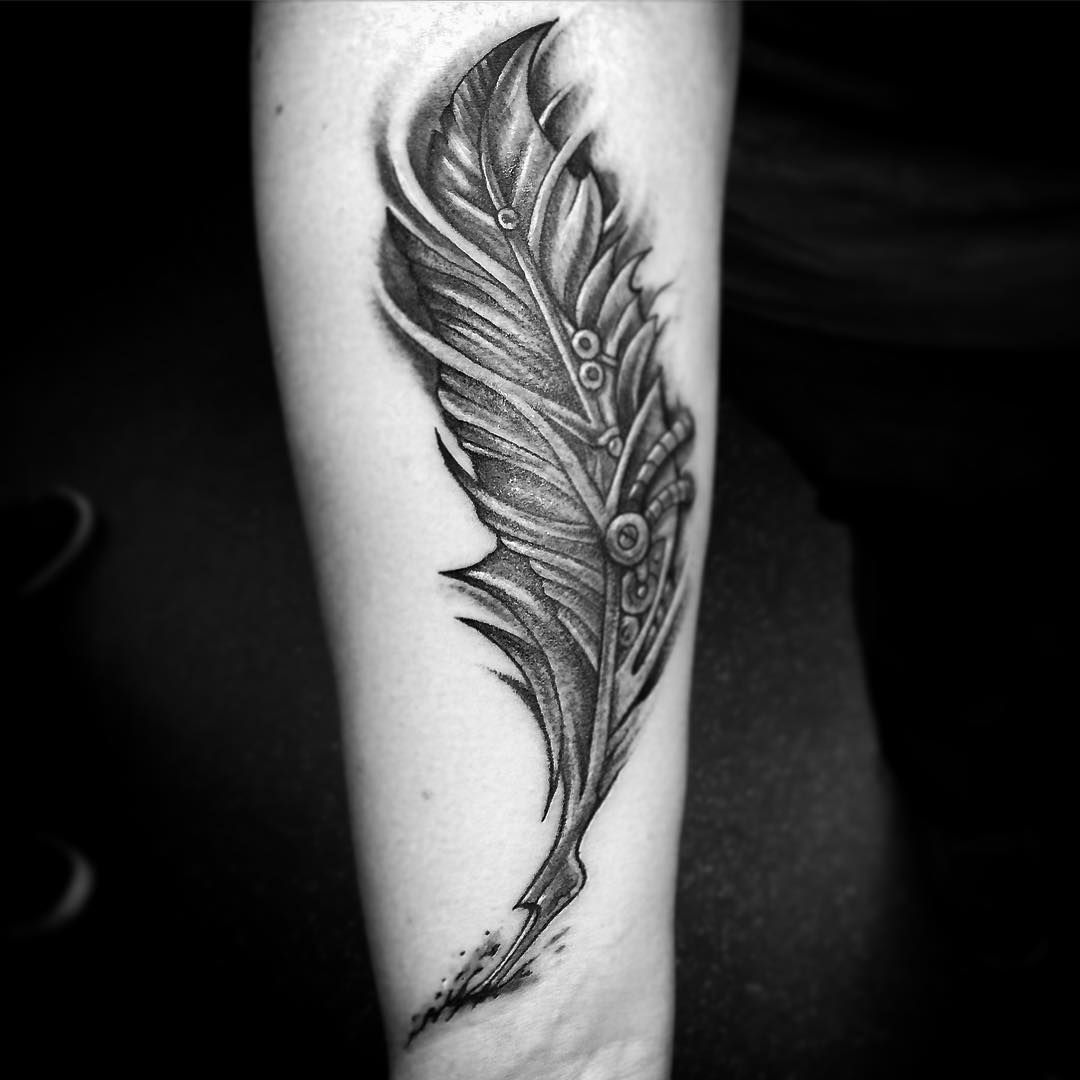 Black and grey feather tattoo