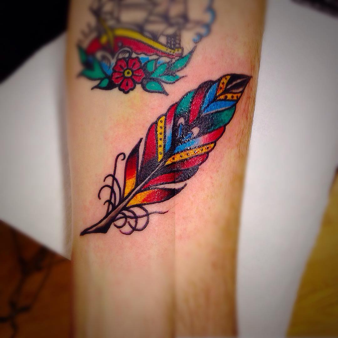 Bold lines feather tattoos