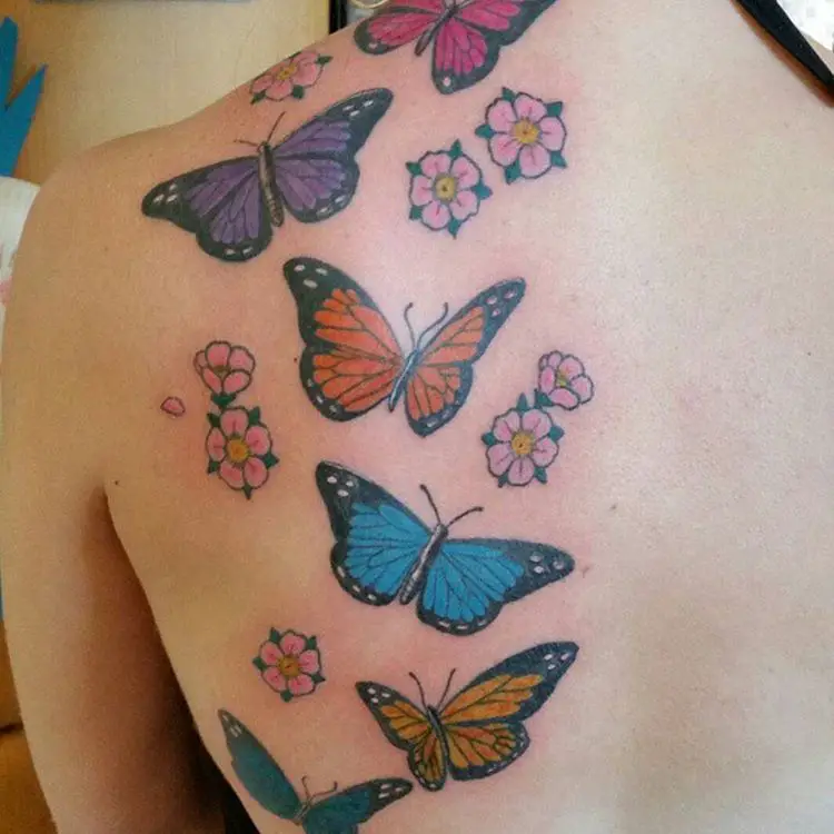 Butterfly Tattoos with Small Flowers