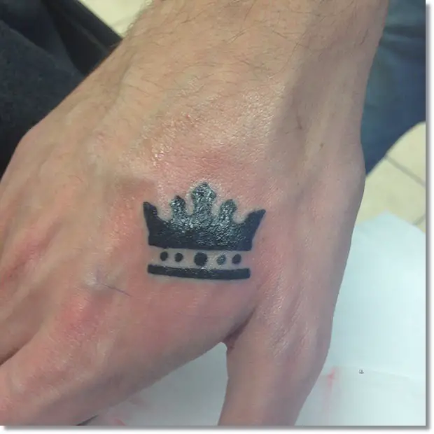 Cool crown tattoo for men on hand