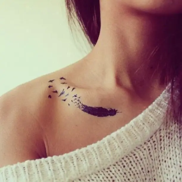 Feather tattoos on collar bone