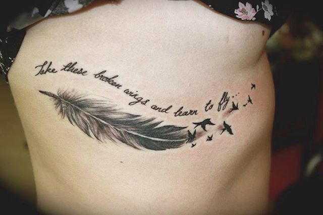 Feather tattoos with words in them