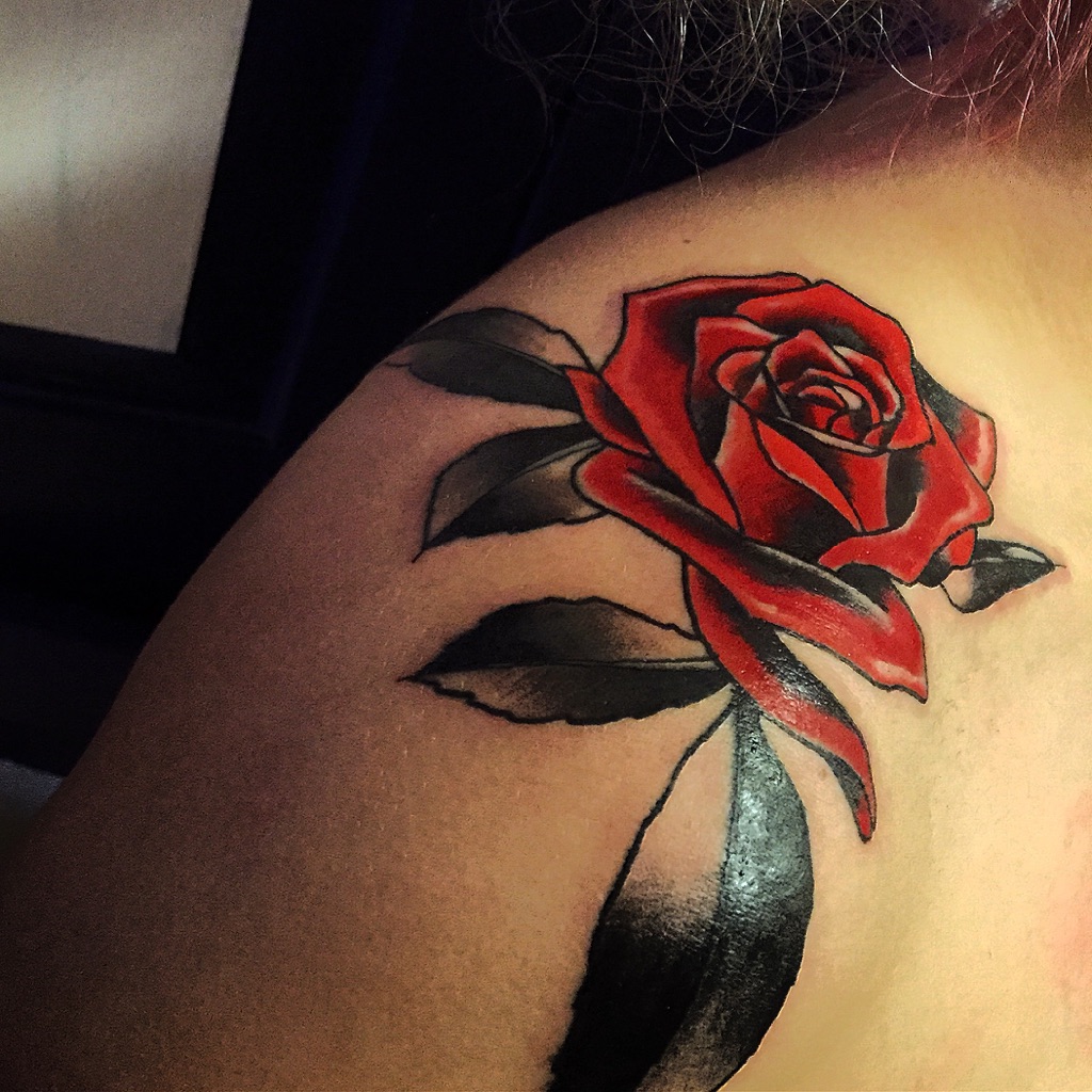 Friday the 13th rose tattoo on shoulder