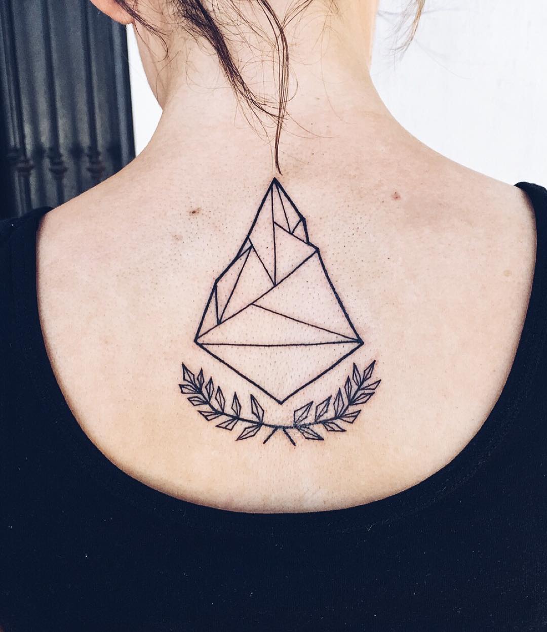 Geometric Tattoo on back of shoulder