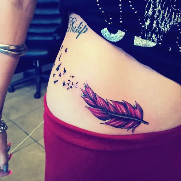 Girly cute feather tattoos