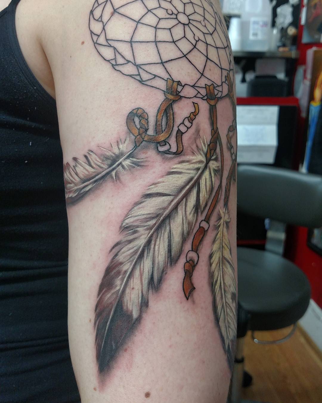 Native feather tattoos via