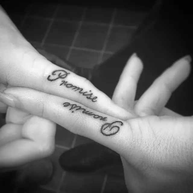Promise tattoo on pinky finger for couple
