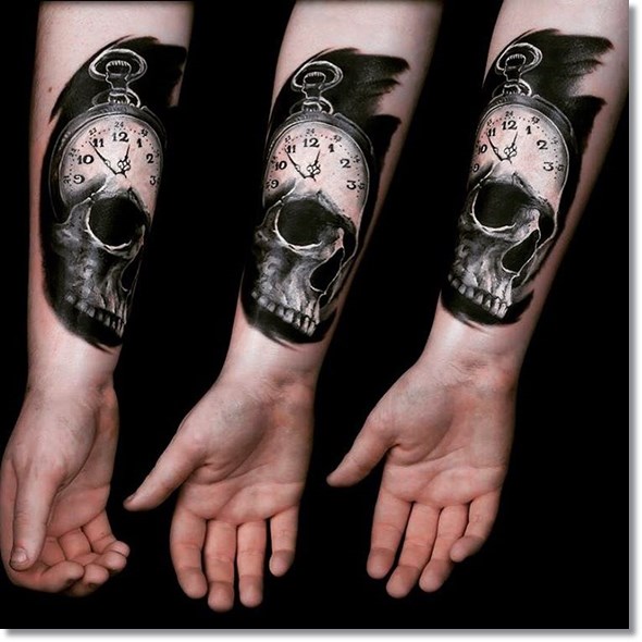 Skull pocket watch tattoo design on sleeve