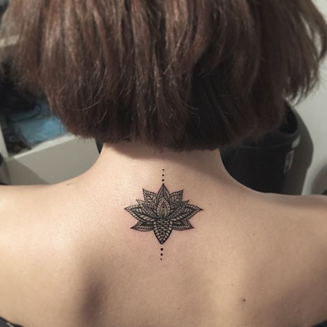 Small lotus mandala tattoo on back