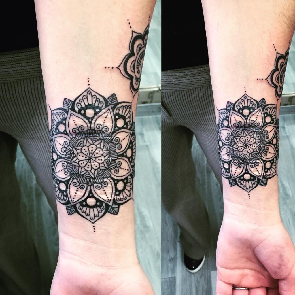 black mandala tattoo patterns on wrist