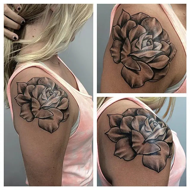 black rose on shoulder girl tattoo