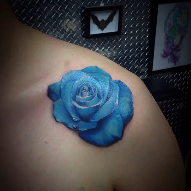 blue rose collar bone tattoo