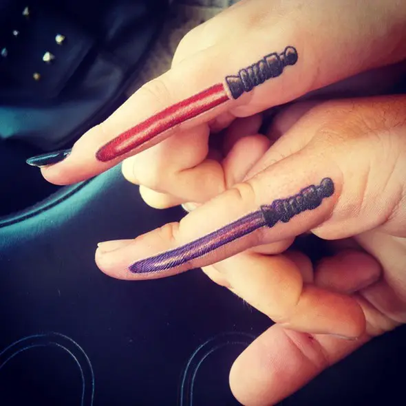brother and sister lightsaber tattoo finger