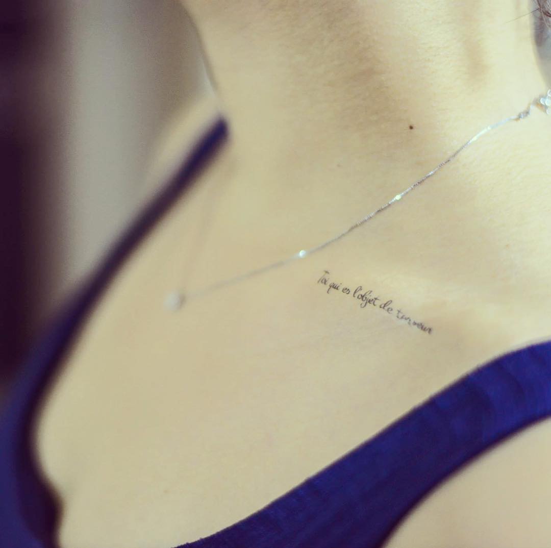 collar bone quote tattoos for girls