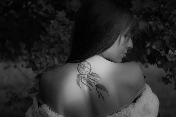 dreamcatcher tattoo on back