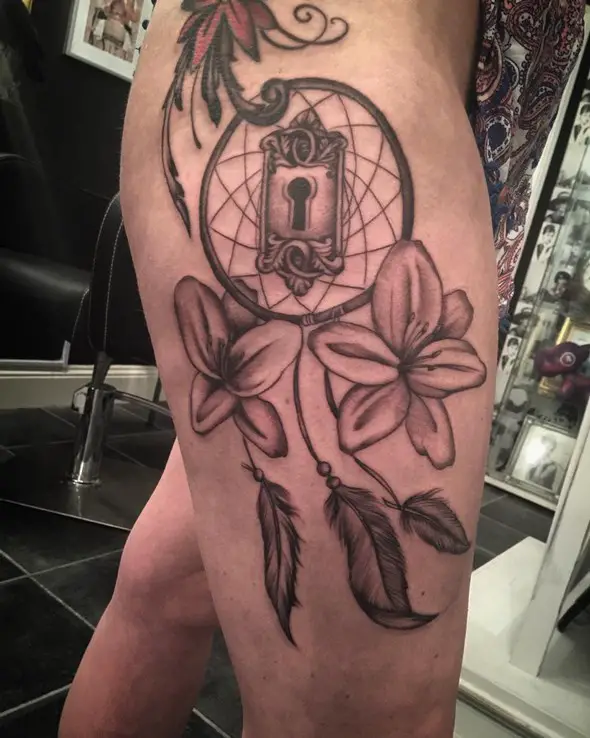 dreamcatcher tattoo on right thigh for girls