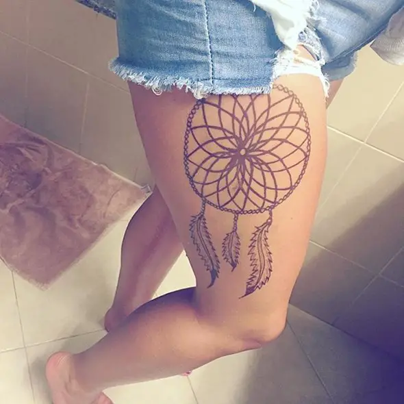 dreamcatcher tattoo on thigh for women