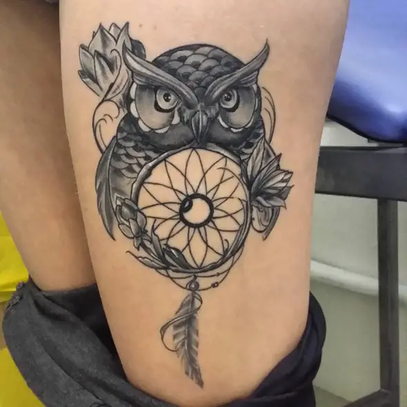 dreamcatcher tattoo on thigh women