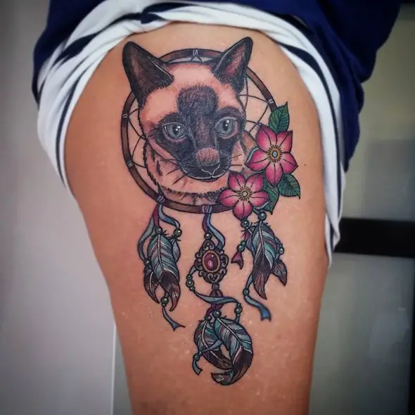 dreamcatcher tattoo on thighs for girls