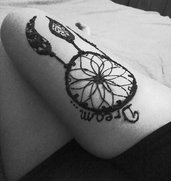 dreamcatcher tattoo on upper thigh