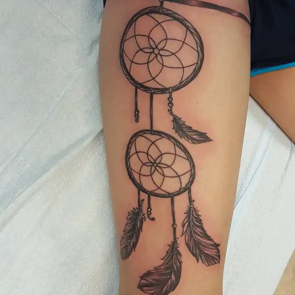 dreamcatcher tattoos on thigh for girls
