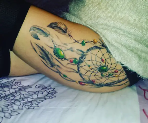 dreamcatcher tattoos on thighs
