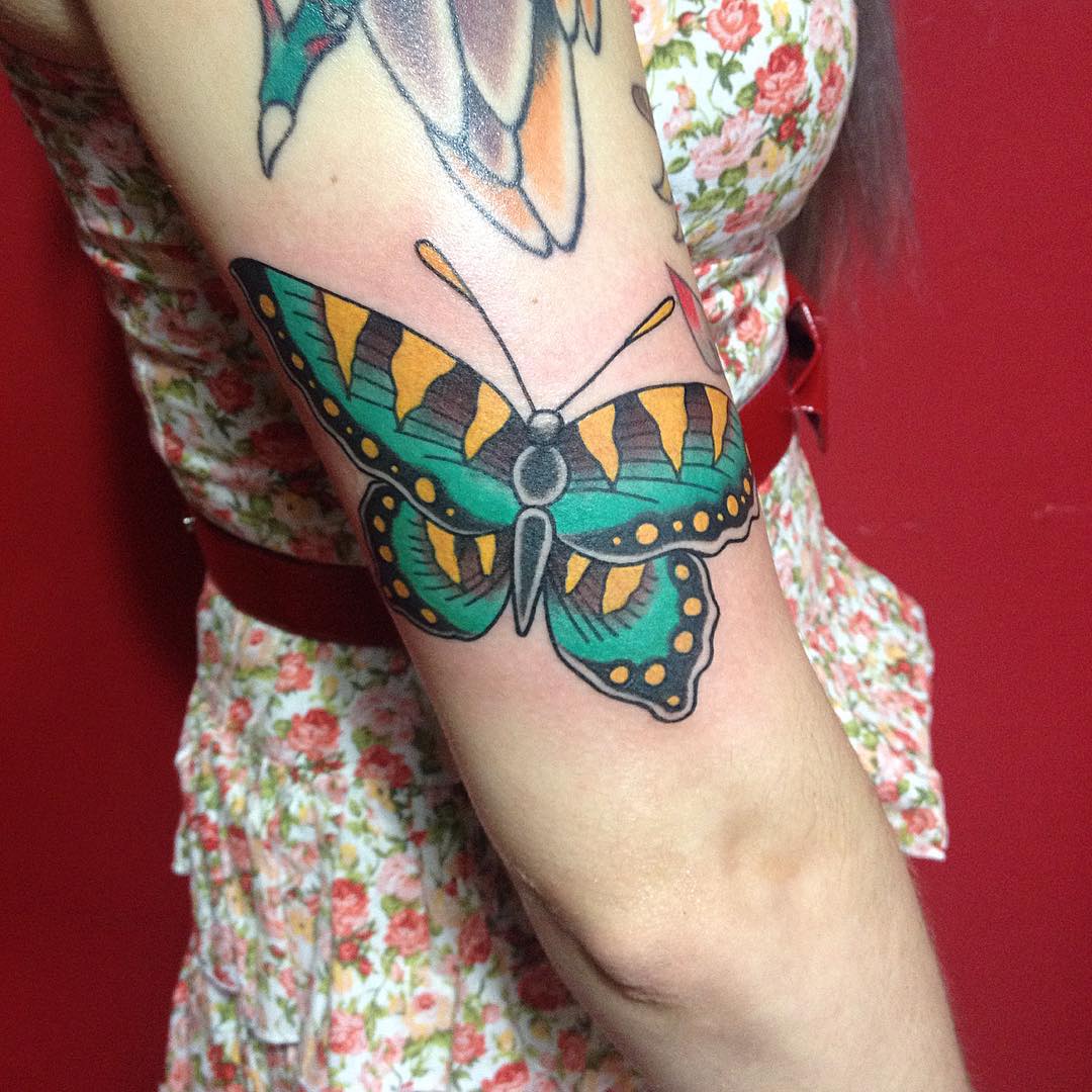 feminine butterfly tattoo