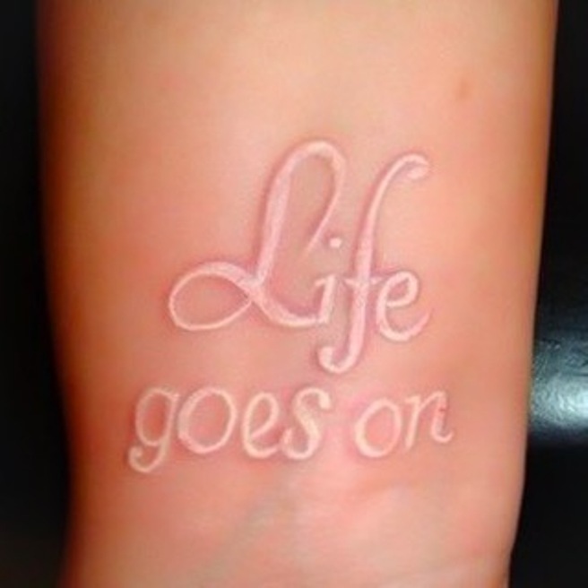 life goes on white ink tattoos