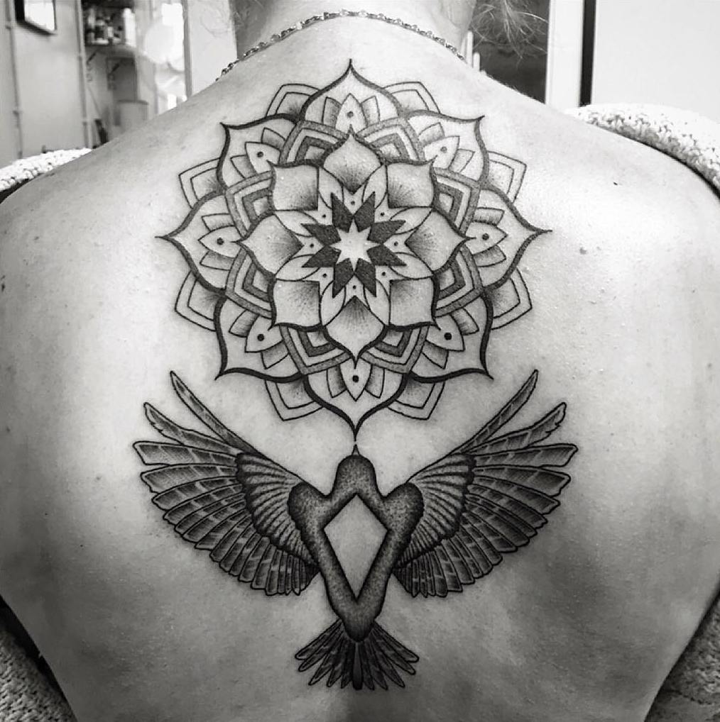 mandala bird tattoo