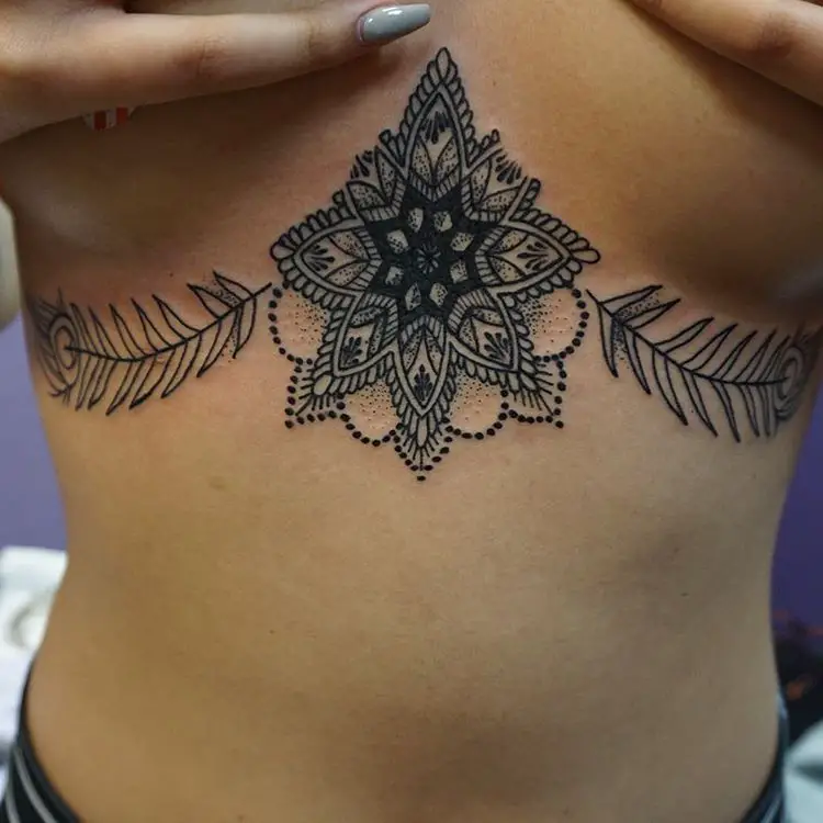mandala tattoos with feathers