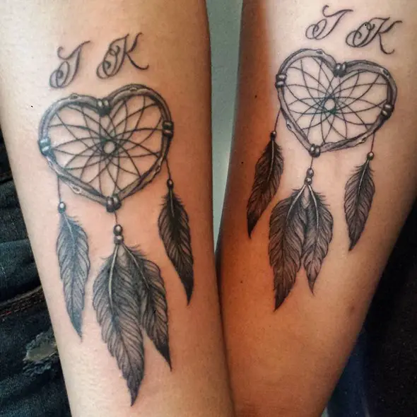 matching small dreamcatcher forearm tattoo