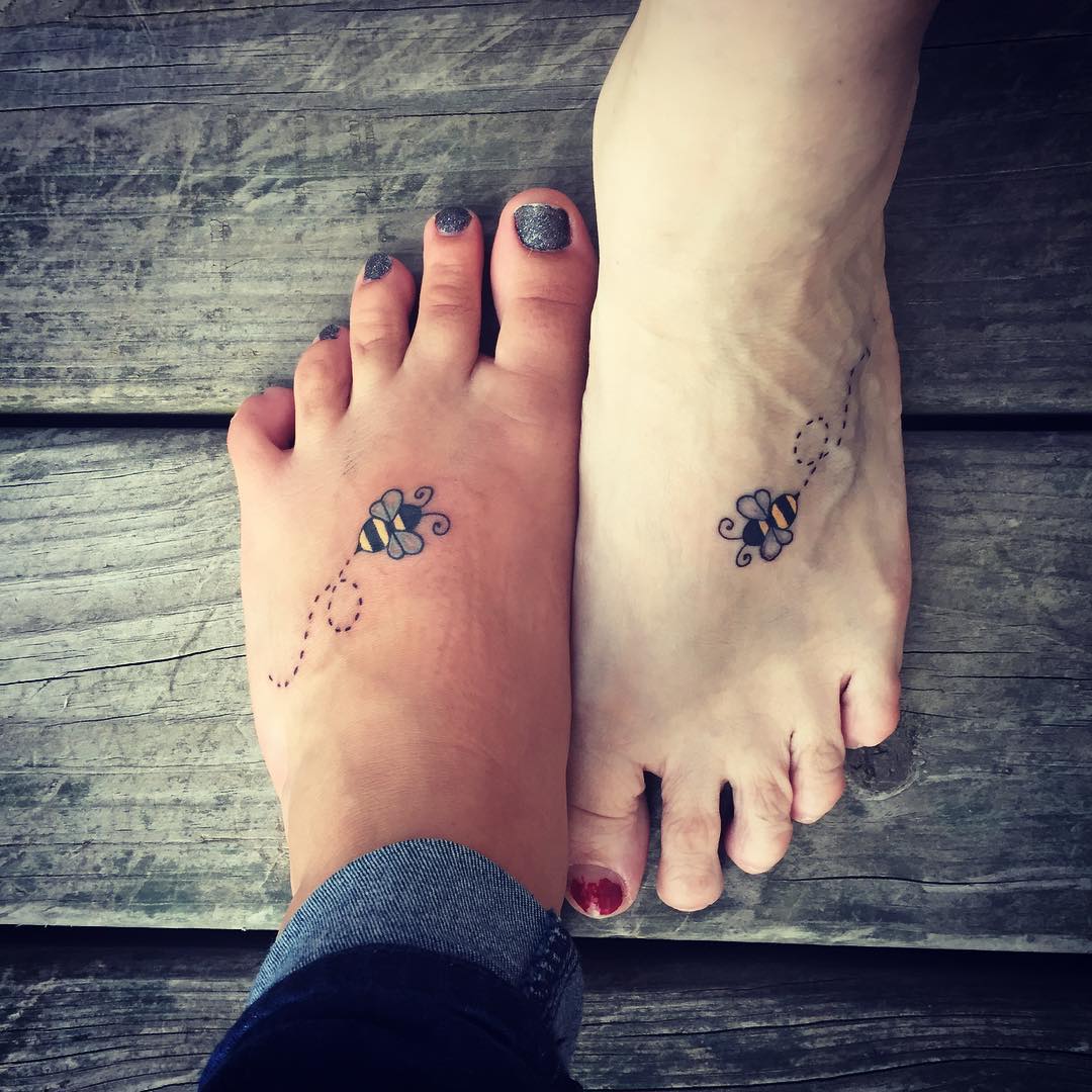 Mom and daughter tattoo symbols.