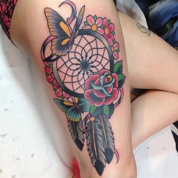 old school dreamcatcher tattoos on thighs