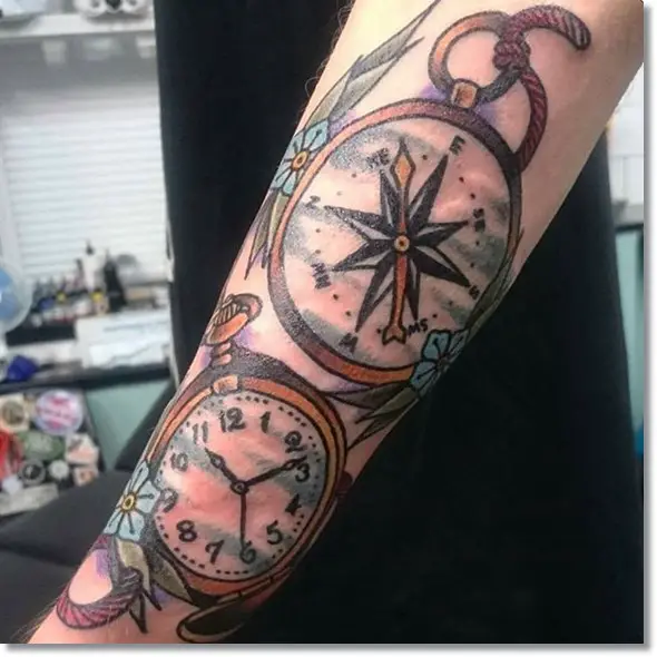 pocket watch compass tattoo on sleeve