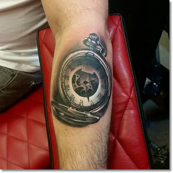 pocket watch tattoo on forearm