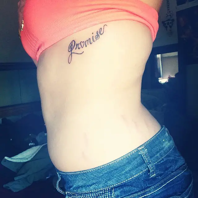 promise tattoo on rib