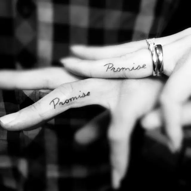 promise tattoo on ring finger for couples