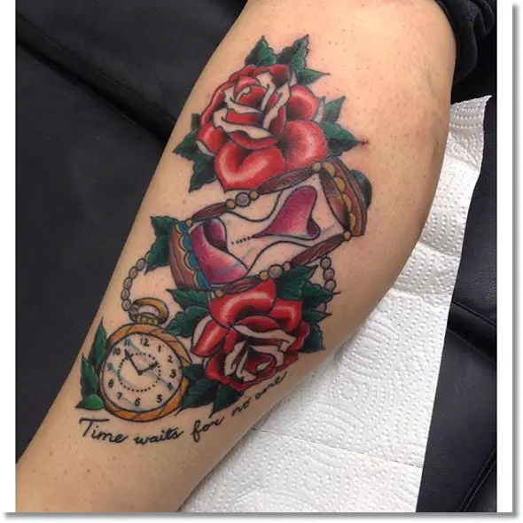 rose and pocket watch tattoo on leg