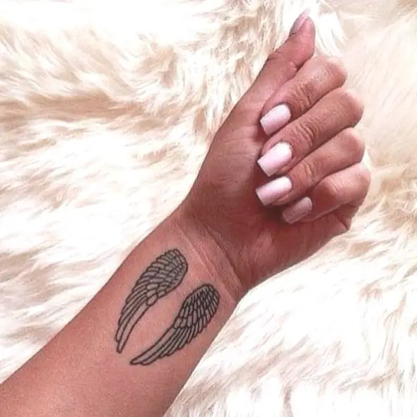 small angel feather tattoo