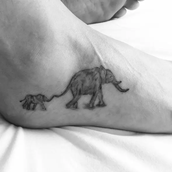 small black and grey elephant tattoo