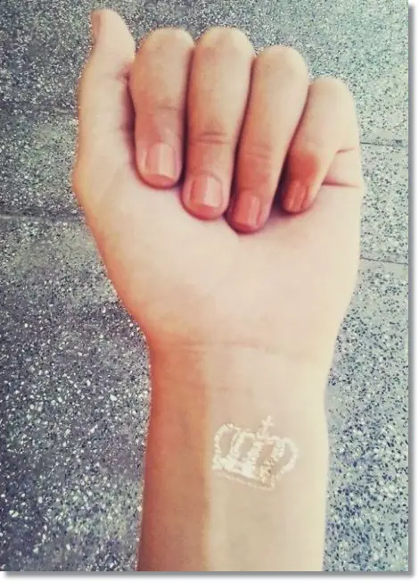 small crown tattoo on wrist 6