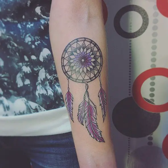 small dreamcatcher tattoo design on forearm