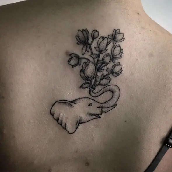 small elephant tattoo with flower