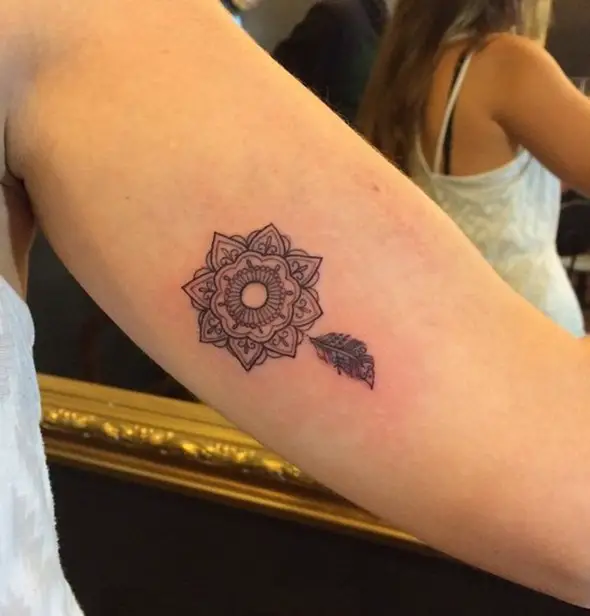 small mandala feather tattoo for women