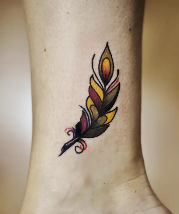 small traditional feather tattoo