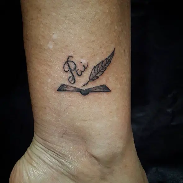 very small feather tattoo on ankle
