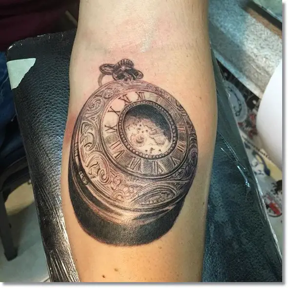 vintage 2015 pocket watch tattoo on forearm