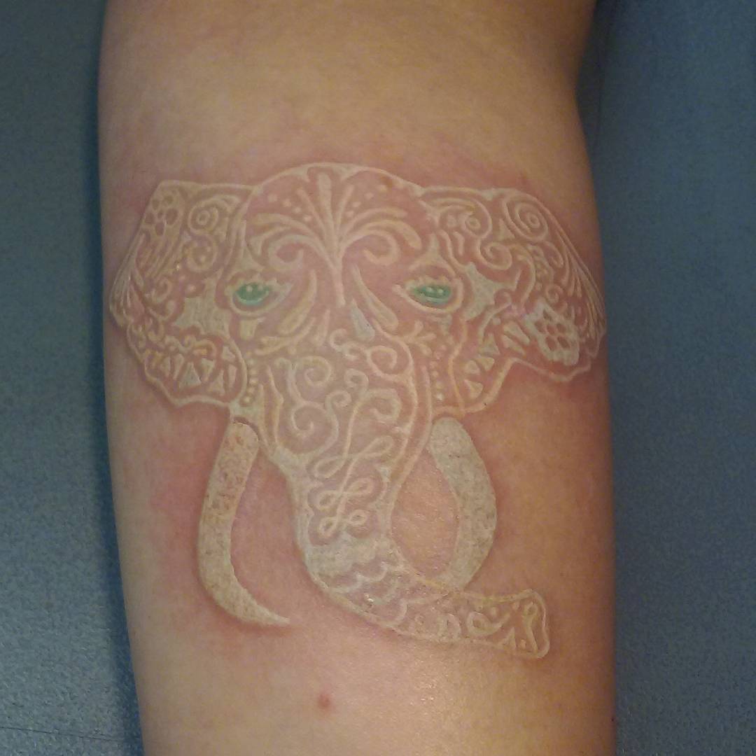 white ink elephant tattoo design