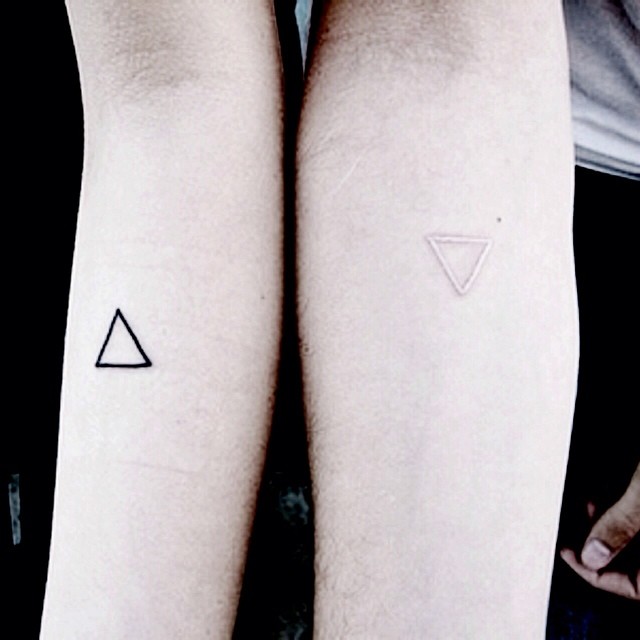 Black & White triangles white ink tattoos
