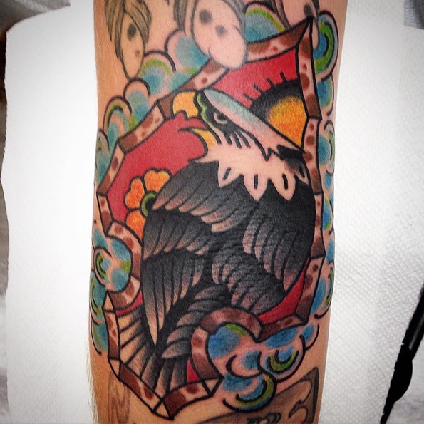 Arrowhead Eagle tattoo on elbow